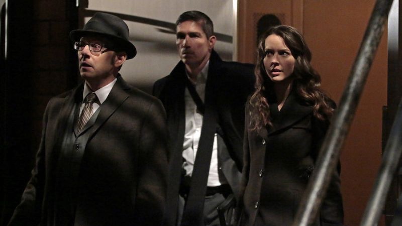 "YHWH" -- Finch (Michael Emerson, left) and Root (Amy Acker, right) race to save The Machine, which has been located by the rival AI, Samaritan, while Reese (Jim Caviezel, center) is caught in the middle of the final showdown between rival crime bosses Elias and Dominic, on the fourth season finale of PERSON OF INTEREST, Tuesday, May 5 (10:01-11:00 PM, ET/PT) on the CBS Television Network.  Photo: Giovanni Rufino/Warner Bros. Entertainment Inc. ÃÂ© 2015 WBEI. All rights reserved.